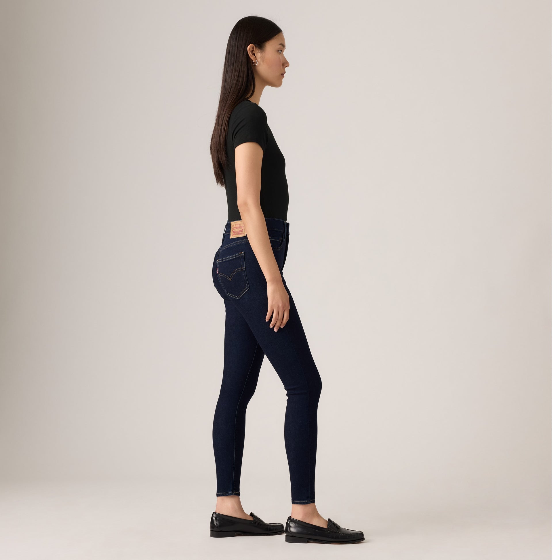 Bella Moda Latina 720 high rise super skinny women's jeans shown in dark denim with a close-up of the fit and stitching details.