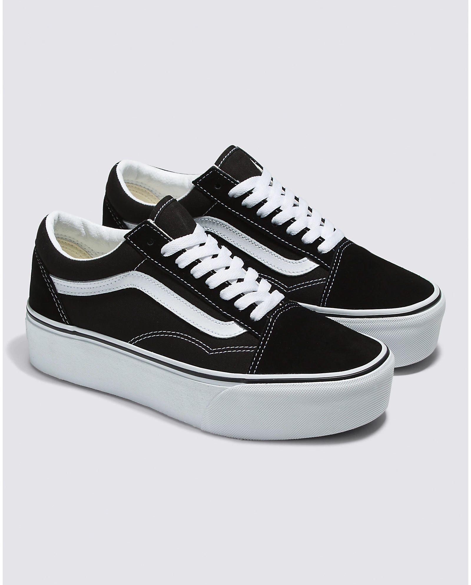 Bella Moda Latina Old Skool Stackform sneakers with black and white design showing stylish side view