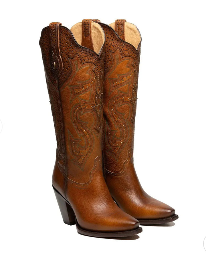 Bella Moda Latina Legado Rio Grande Hanna with vibrant, colorful embroidery on traditional Mexican textile background.