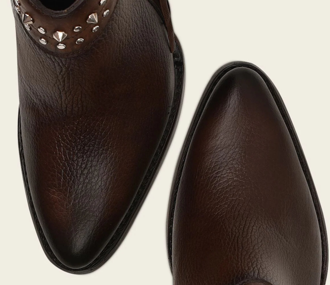 Bella Moda Latina LD chocolate pointed toe shoe with zipper, studs, fringe details, and fringe accents on the front.