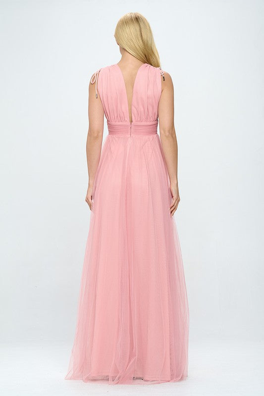 Bella Moda Latina plunging neckline layered tulle maxi dress shown in elegant design with flowing fabric and intricate details.