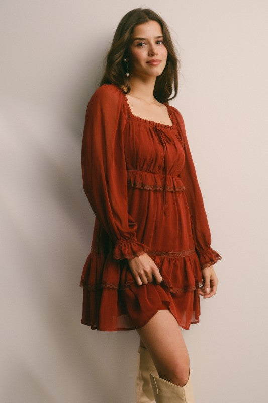 Crinkled tiered boho mini dress by Bella Moda Latina featuring a flowy, layered design perfect for casual summer wear.