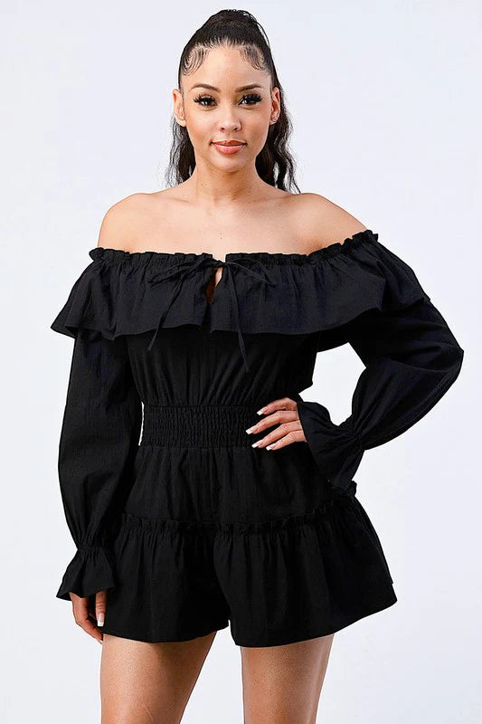 Bella Moda Latina off shoulder ruffled layered puff sleeve romper in a vibrant color, showcasing its stylish design and details.