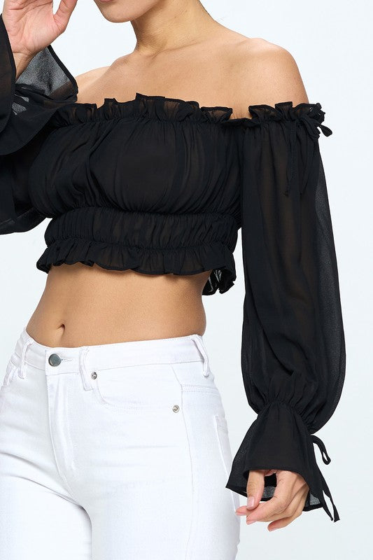Off shoulder ruffle trim knot sleeve crop top by Bella Moda Latina, featuring feminine ruffles and knot detail on a stylish top.