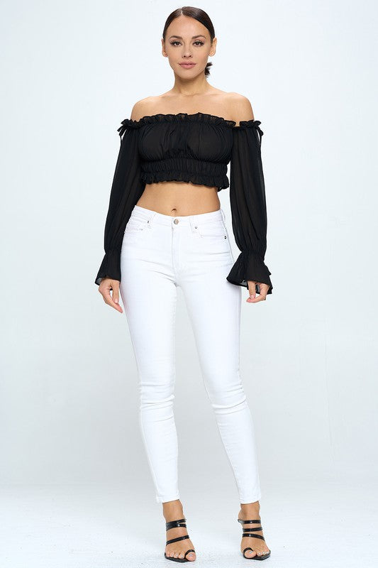 Off shoulder ruffle trim knot sleeve crop top by Bella Moda Latina, featuring a stylish off-the-shoulder design and ruffle details.